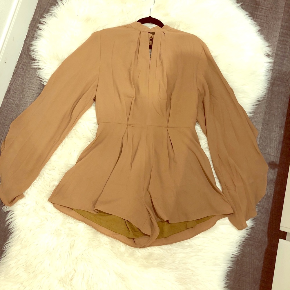 Romper. NWT. LARGE.